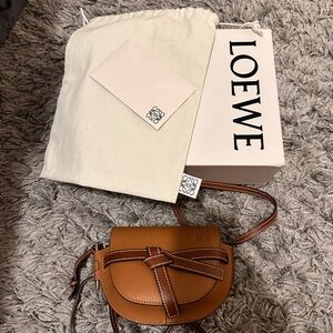 LOEWE Grained Calfskin Mini Gate Crossbody Bag in Caramel and Pecan.